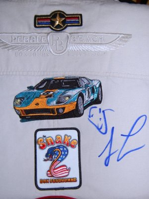 Jay Leno's smiling chin face autograph on my car event jacket