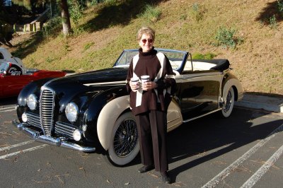 Mom with color coordinated 7-figure Delahaye