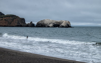 Surfer at Rodeo Beach