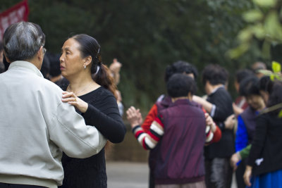 as thousands of city's elderly residents start their morning routine, ... some dancing  