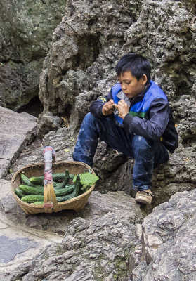 boy selling cucumber 