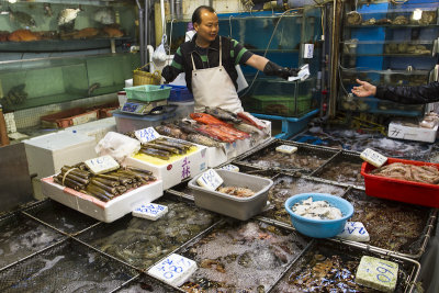 fishmonger at work 