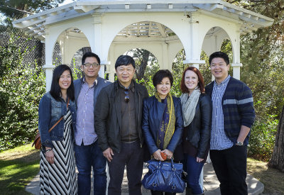 in front of a wedding gazebo 