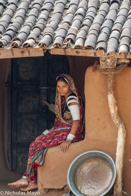 India (Gujarat) - Woman Seated At Doorway