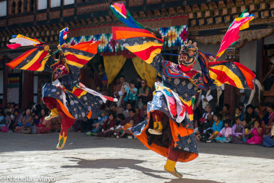 Bhutan (East) - Masked Monks Performing A Cham Dance