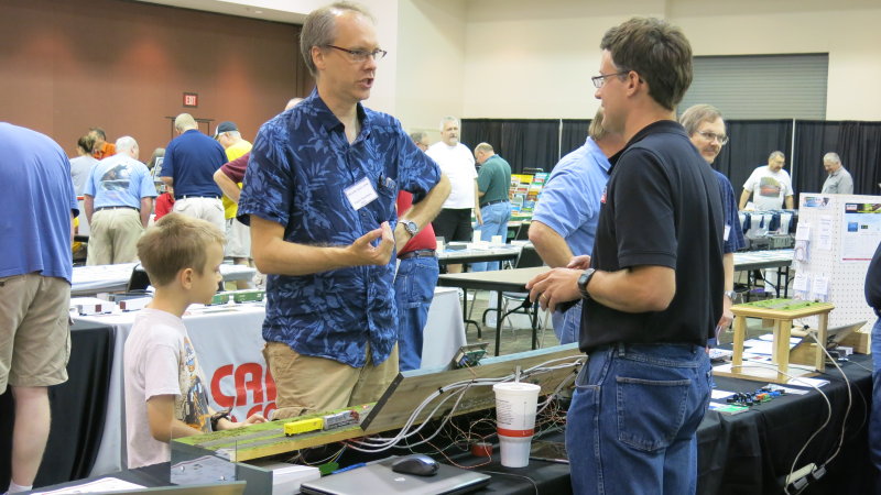 Dan Kohlberg, left, St. Louis RPM host and owner of ICG Custom Decals