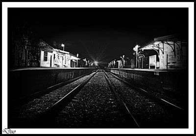Eerie Atmosphere Of Night At A Country  Railway Station.