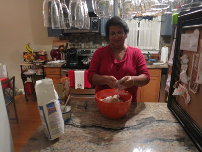 Mom kneading bread