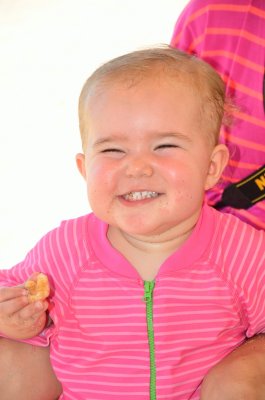 Clara's first experience with a chicharron.  I think she liked it :)