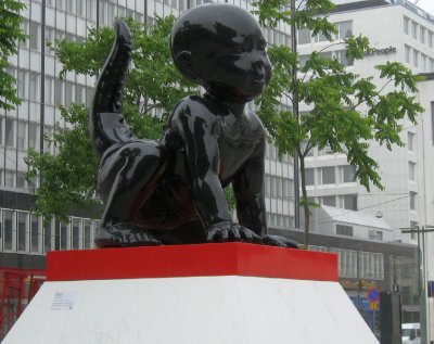 Child-lizard sculpture