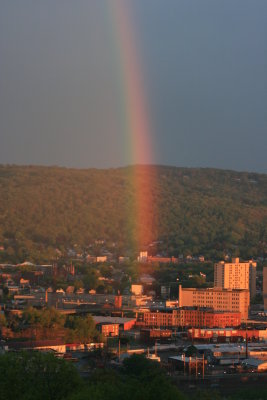 Rainbow Photo over city