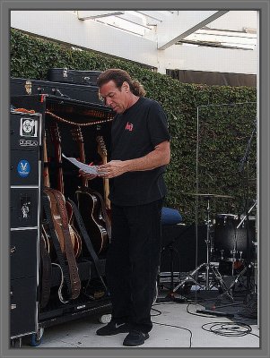 Mark getting the guitars ready pre-show Newport Beach  