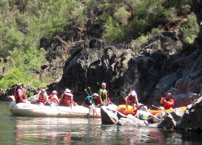 The Sacramento Paddle Pushers Group Moored Beneath Jumping Rock on the American River