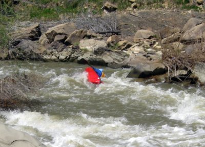 Dave LaDue Rolls His Canoe in the S-Curve at Cache Creek