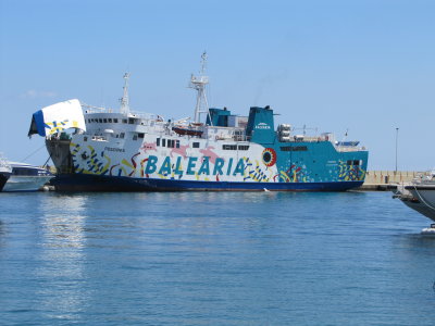 Car Ferry Posidonia makes four crossings in each direction, with fares reduced considerably from those on Nixe, their fast car ferry. 
Return passenger fares are around 70% of fast ferry prices.

Probably a replacement for Arlequin Rojo.