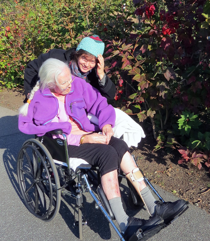 Louisa and Flora next to Highbush Cranberry Planting