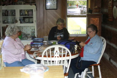 The ladies chat in the dining room