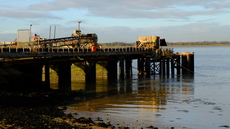 The  riverside  pier  for  the  Sand  and  Gravel  Co.