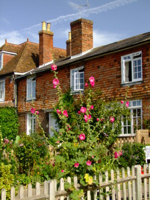 Pretty  cottages  and  Hollyhocks.