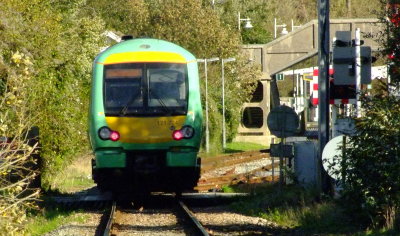 A  train  slowing  into  Rye  station.