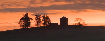 The  Repentence Tower silhouetted  in  dawn light.