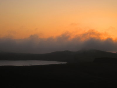 Cloud  sitting  on Sewingshield  Crags