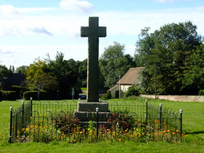 Flowers  surrounding  the  War  Memorial  on  the  green.