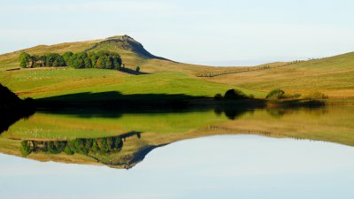 Winshield  Crags , reflected  in  Crag  Lough.