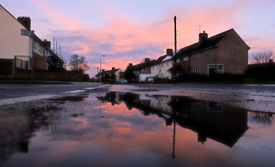 Dawn light reflected on the street