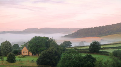 A  misty  dawn  in  the  Clun  Valley