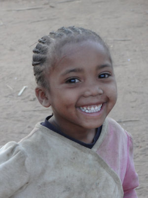 A huge smile on a little girl