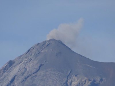Volcano Fuego emitting a puff