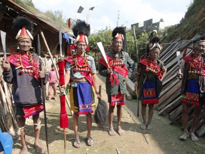 These men are former headhunters; members of the Konyak tribe. They giggled as they danced for us, pretending to be hunting.