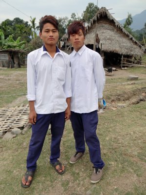 Check out these mod hairdos on school boys in a very simple village!