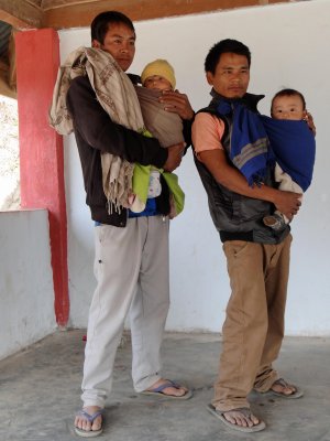 Fathers taking care of babies during the festival