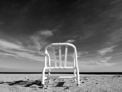Abandoned Chair on the Beach