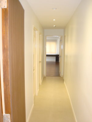 Hallway Leading to Bedrooms from the Living Room area.JPG