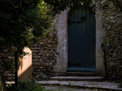 Church Door and Gravestone