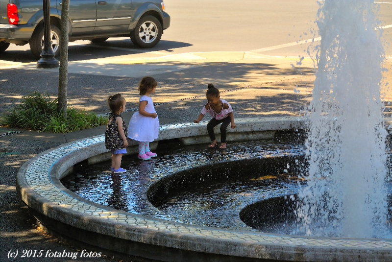 Three Kids in a Fountain.