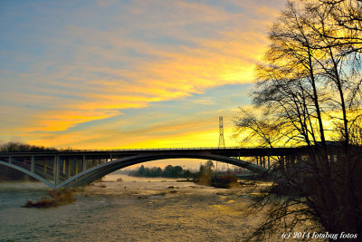 Sunrise over Whilamut Passage Bridge