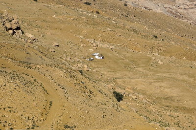 down the slopes we see many bedouin camps