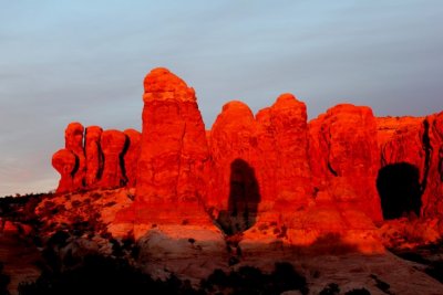 Sunset turns the rock a fiery red. Arches National Park