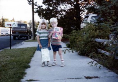 02 Erica and Keith on the sidewalk in front, with Fruit Loops.jpg