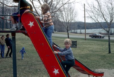01 Erica and Keith on slide at Mendon Ponds.jpg
