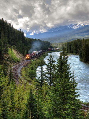 CP train following the Bow River