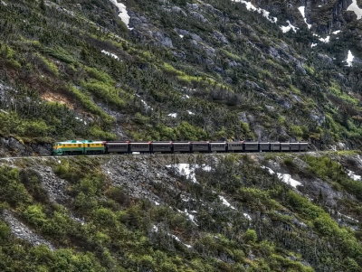 Long tourist train on the White Pass & Yukon Route Railroad
