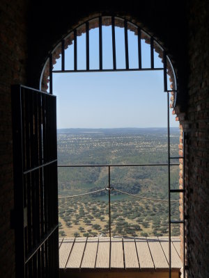 far across the dehesas