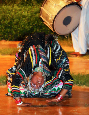 DANCER PICKING UP RING WITH HER EYE LIDS - ALSO DID A RAZOR BLADE