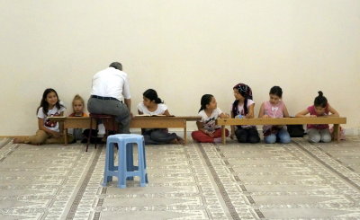 Young girls learning to read the Koran