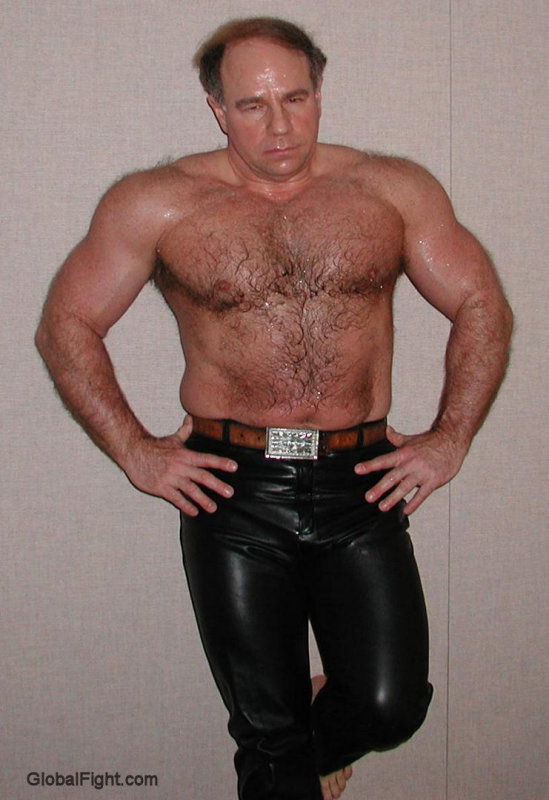 leather daddie big huge deltoids.jpg